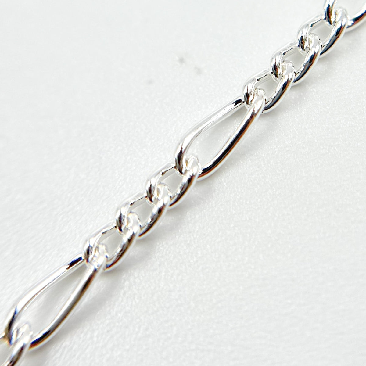 2031CSS. Sterling Silver Figaro Chain