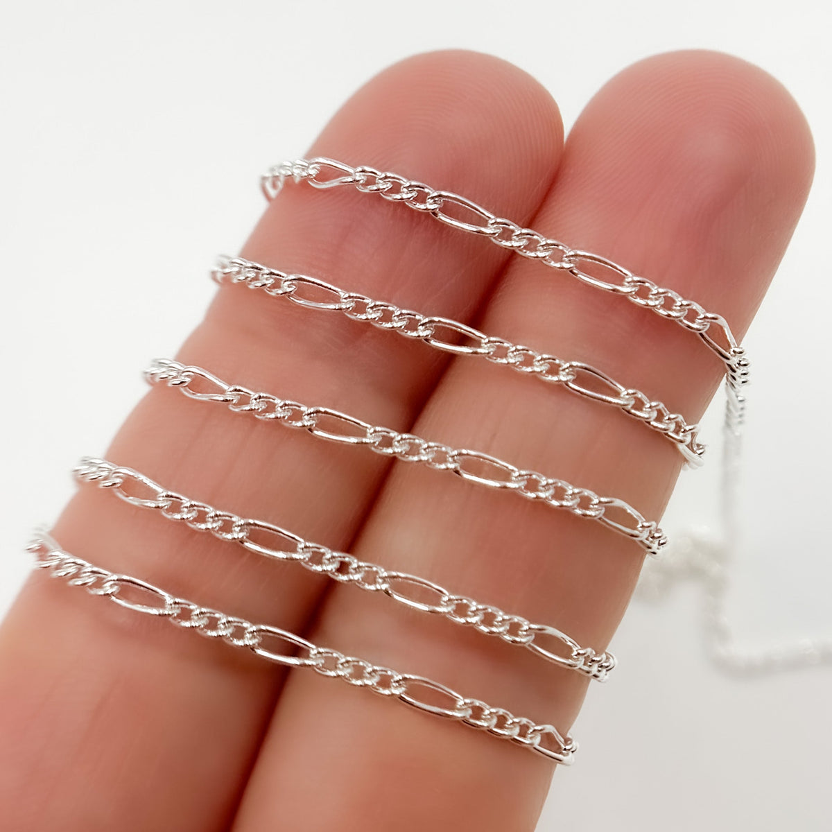 2031CSS. Sterling Silver Figaro Chain