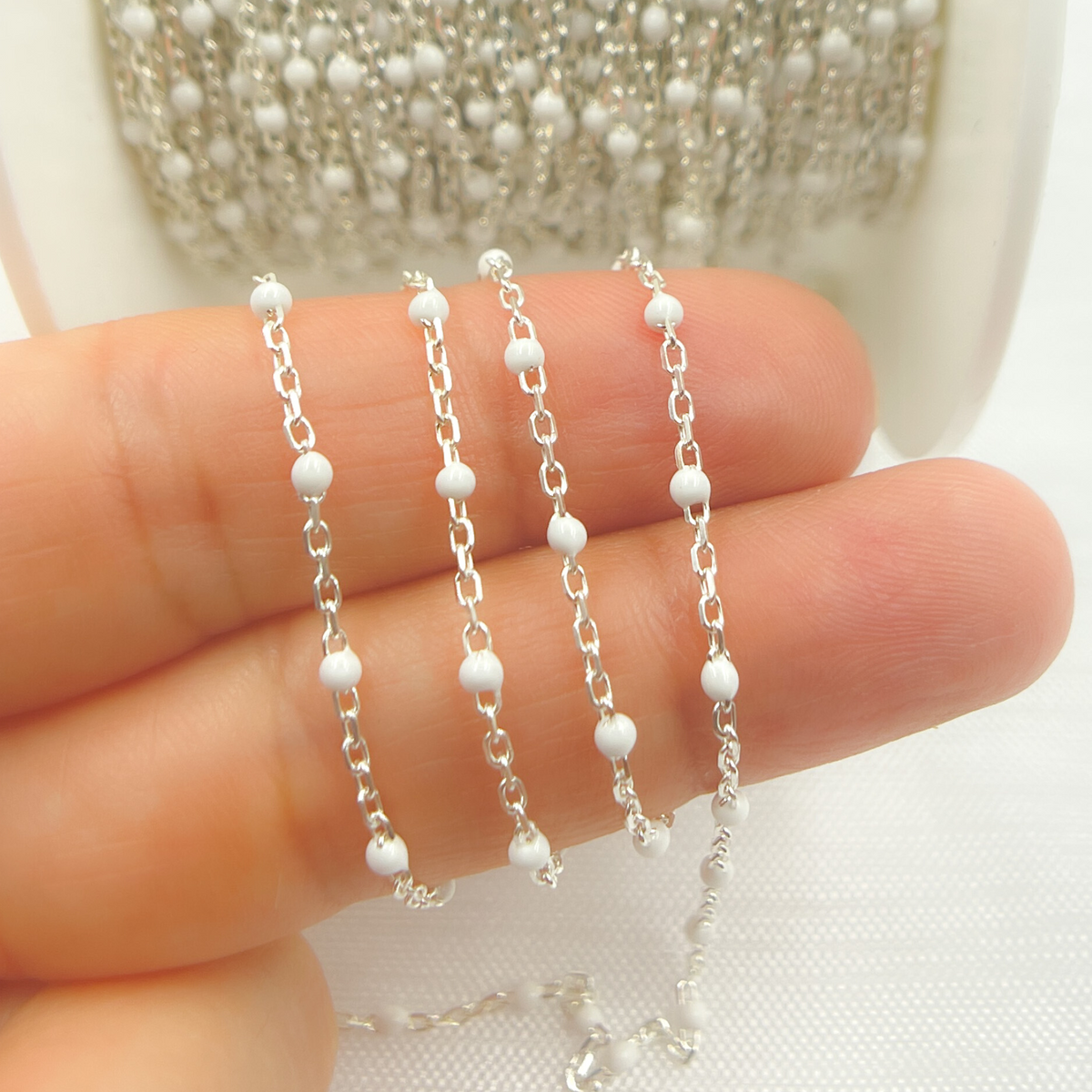 V203WTSS. Sterling Silver White Color Enamel Chain