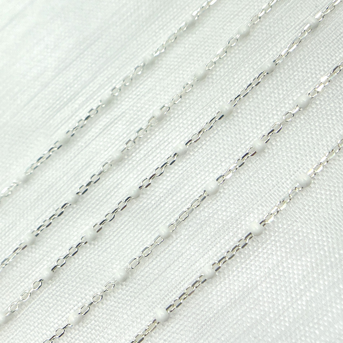 V203WTSS. Sterling Silver White Color Enamel Chain