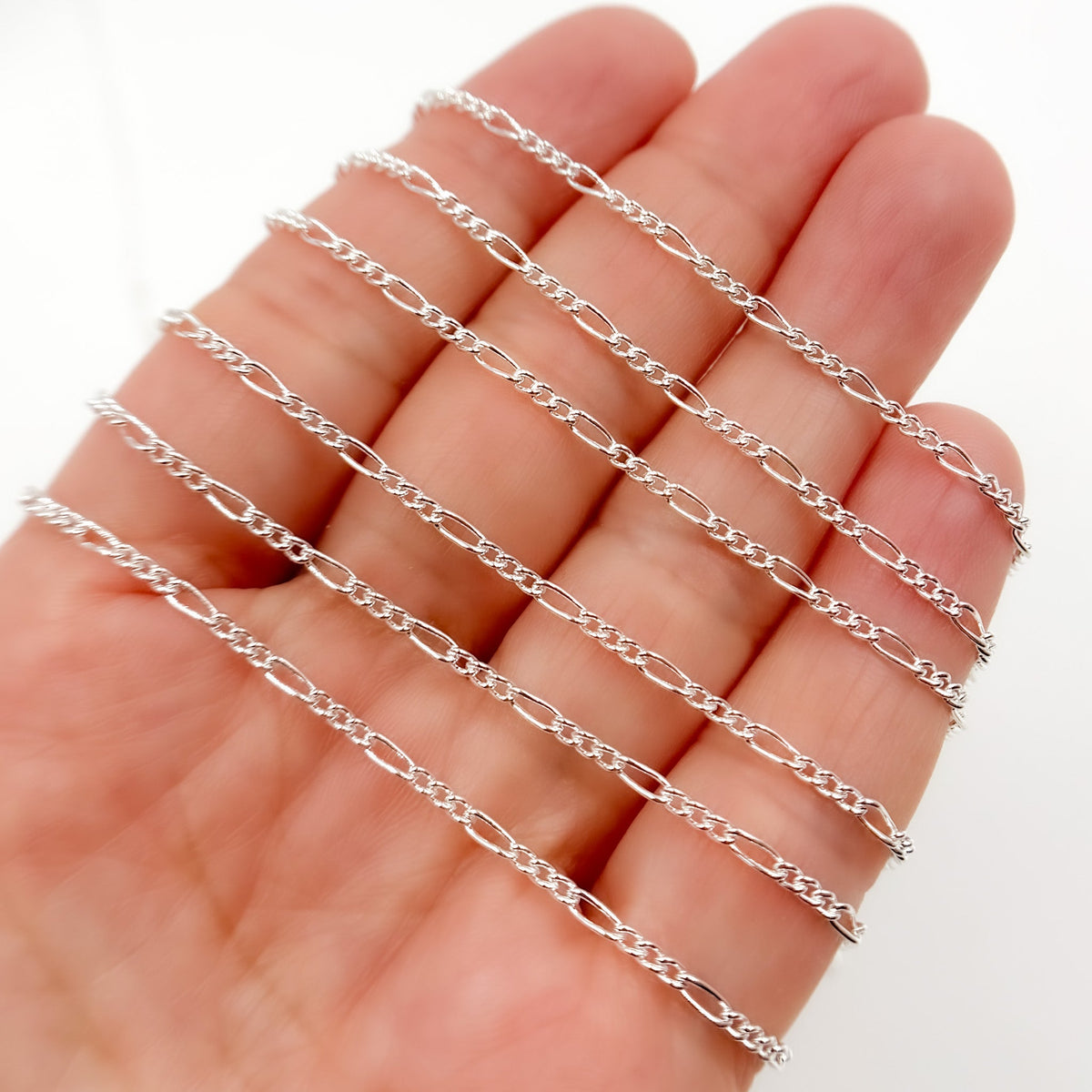 2031CSS. Sterling Silver Figaro Chain